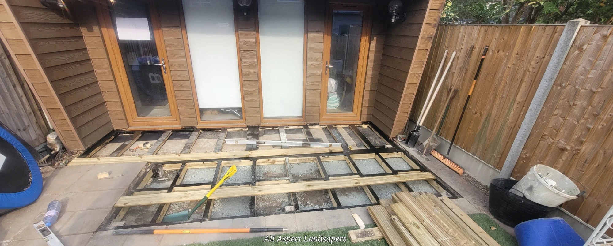 Wooden office with decking.
